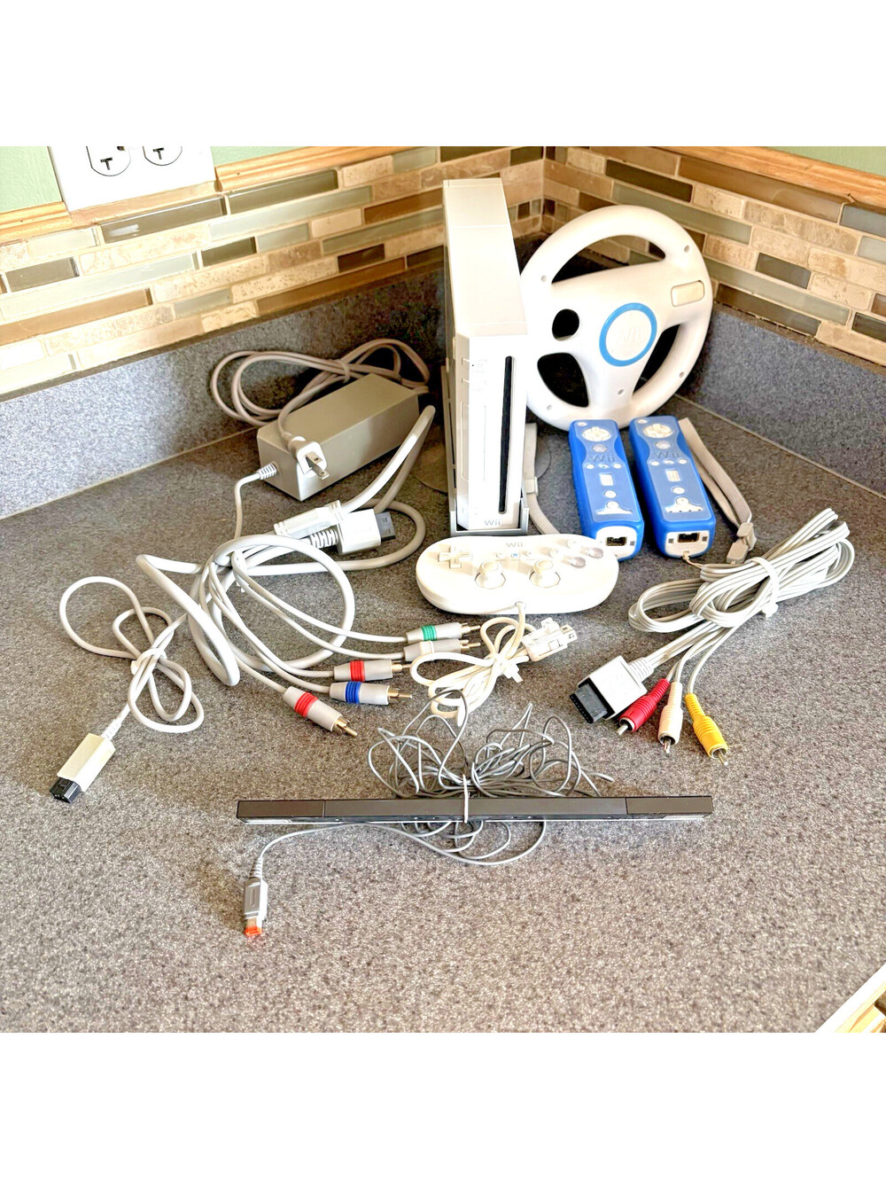 White Nintendo Wii -- Bundle Controllers, Steering Wheel, 2 TV Cables- tested